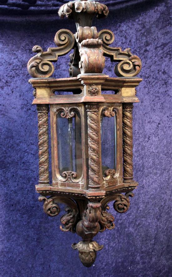 A large 19th century carved giltwood hanging lantern, 43in.